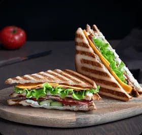 BETWEEN THE BREADS